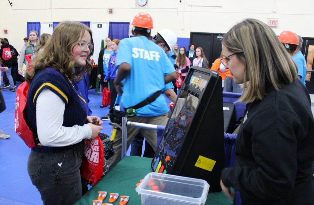 student looking at display