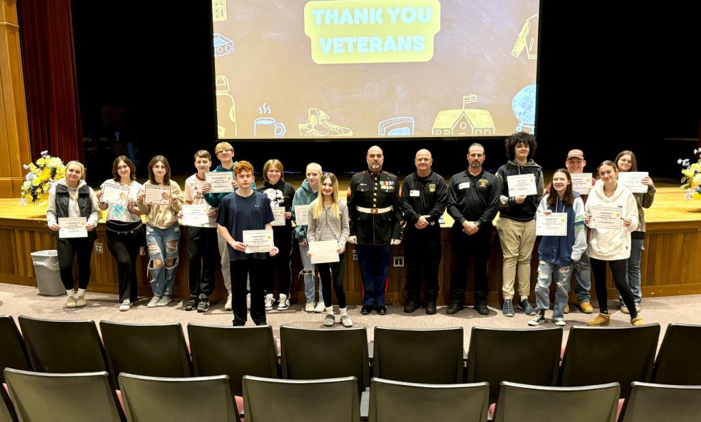 phot of students presenting awards.