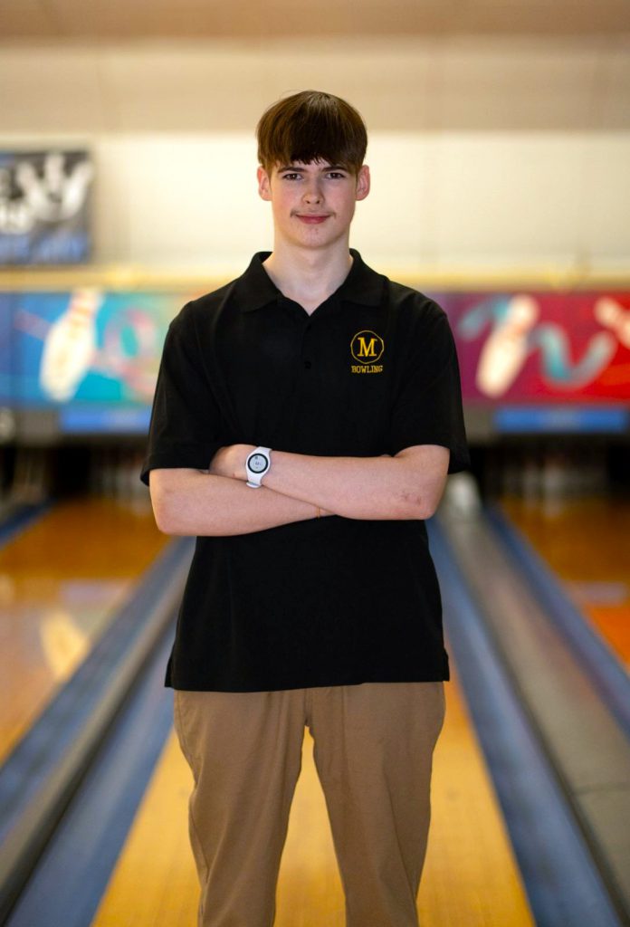 photo of a bowling student in front of bowling lane