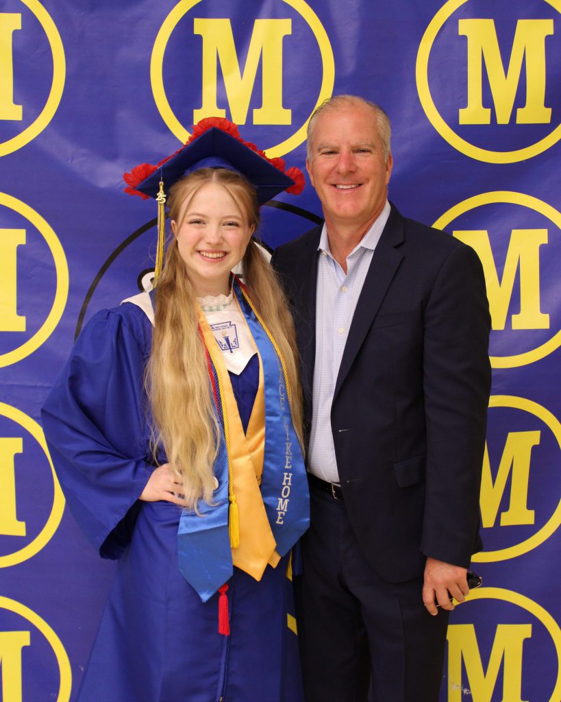 photo of graduate with parent