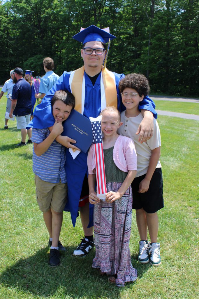 Photo of graduate with family