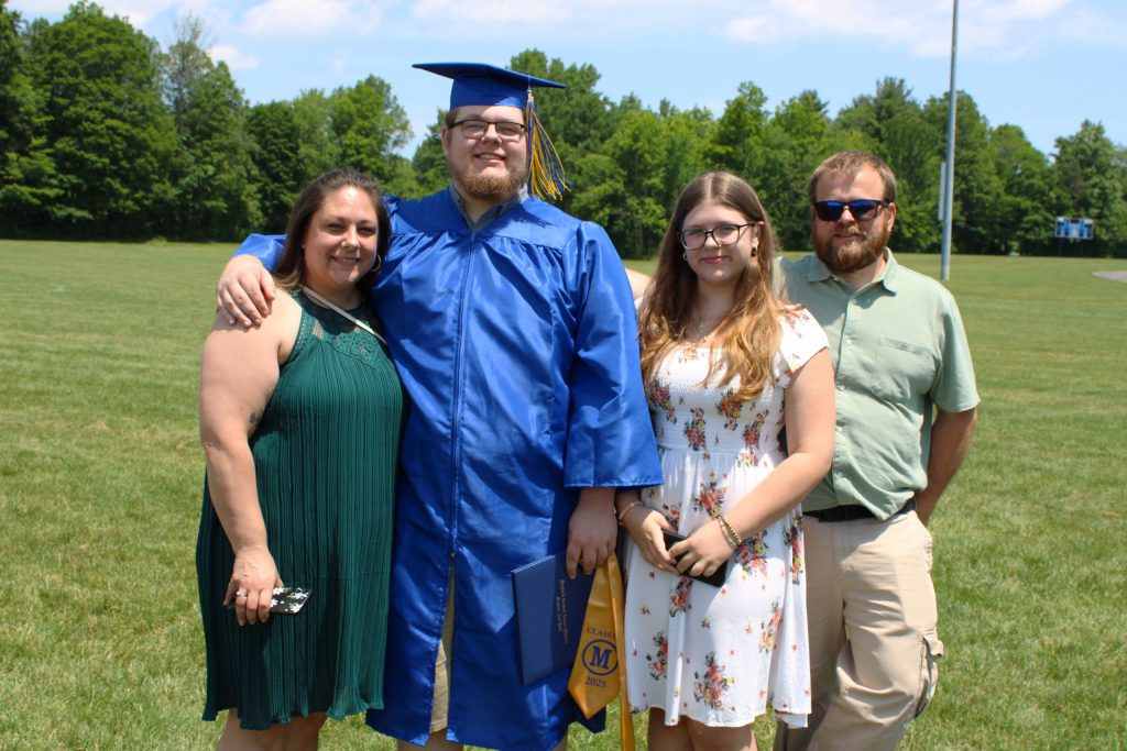 photo of graduate with family