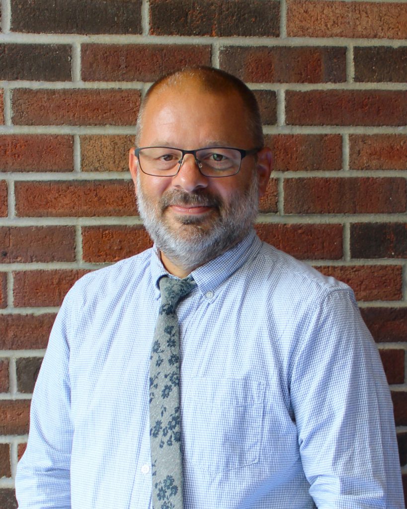 Headshot of Jon Caraco.