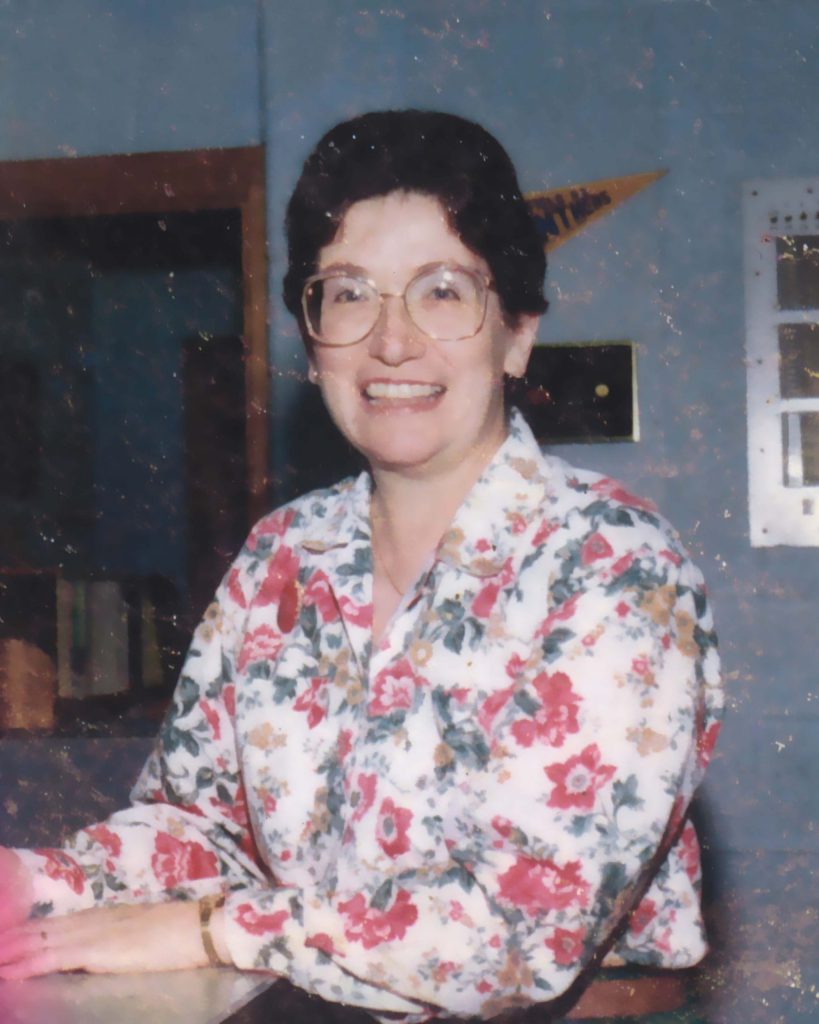 Headshot of LaVada in floral print shirt.